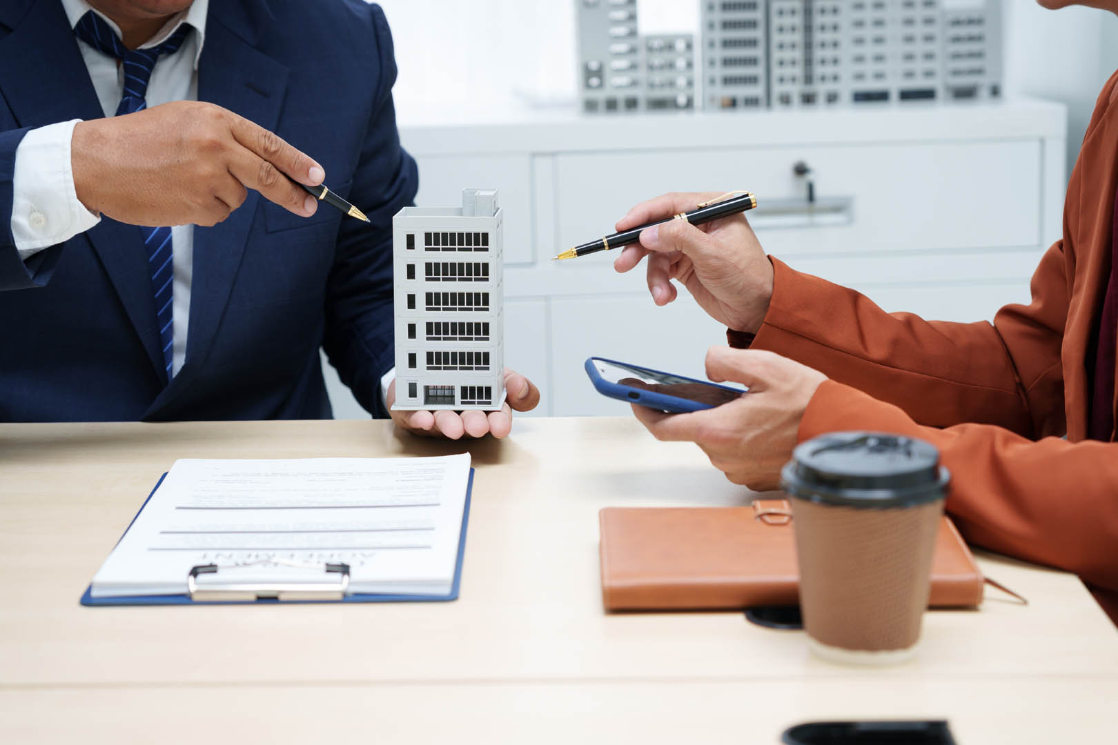 Professional conducting property market analysis