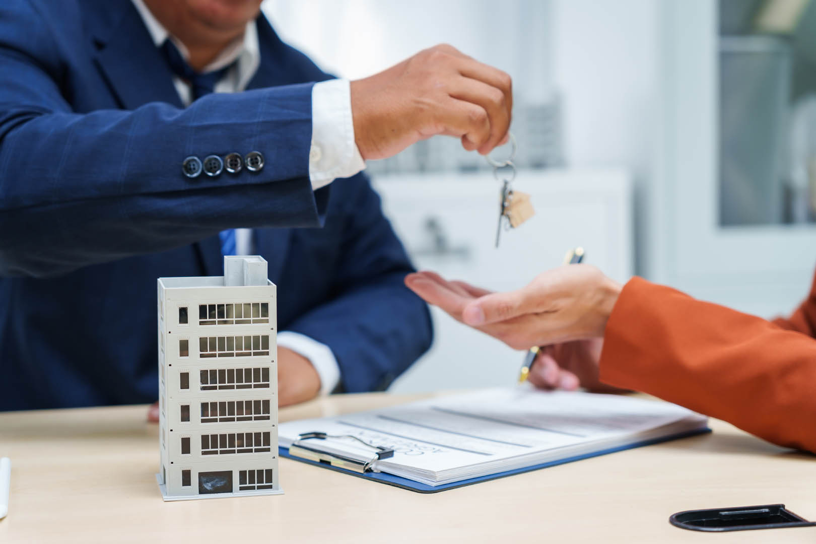 Business professional at desk in sales office
