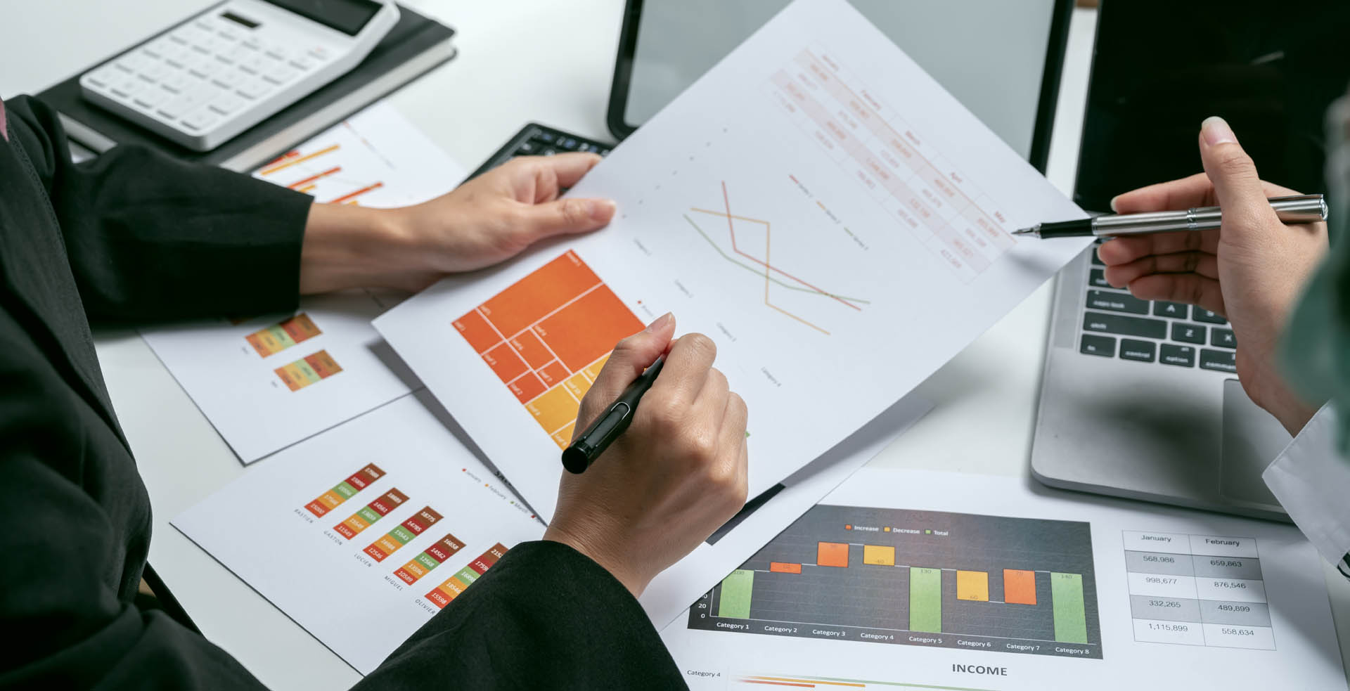 Business team consulting and analyzing market data
