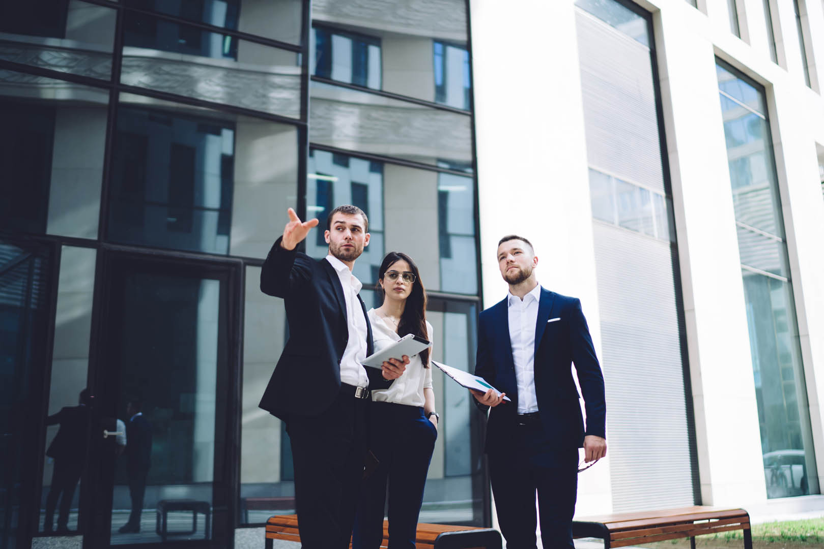 Business professionals discussing commercial real estate strategy