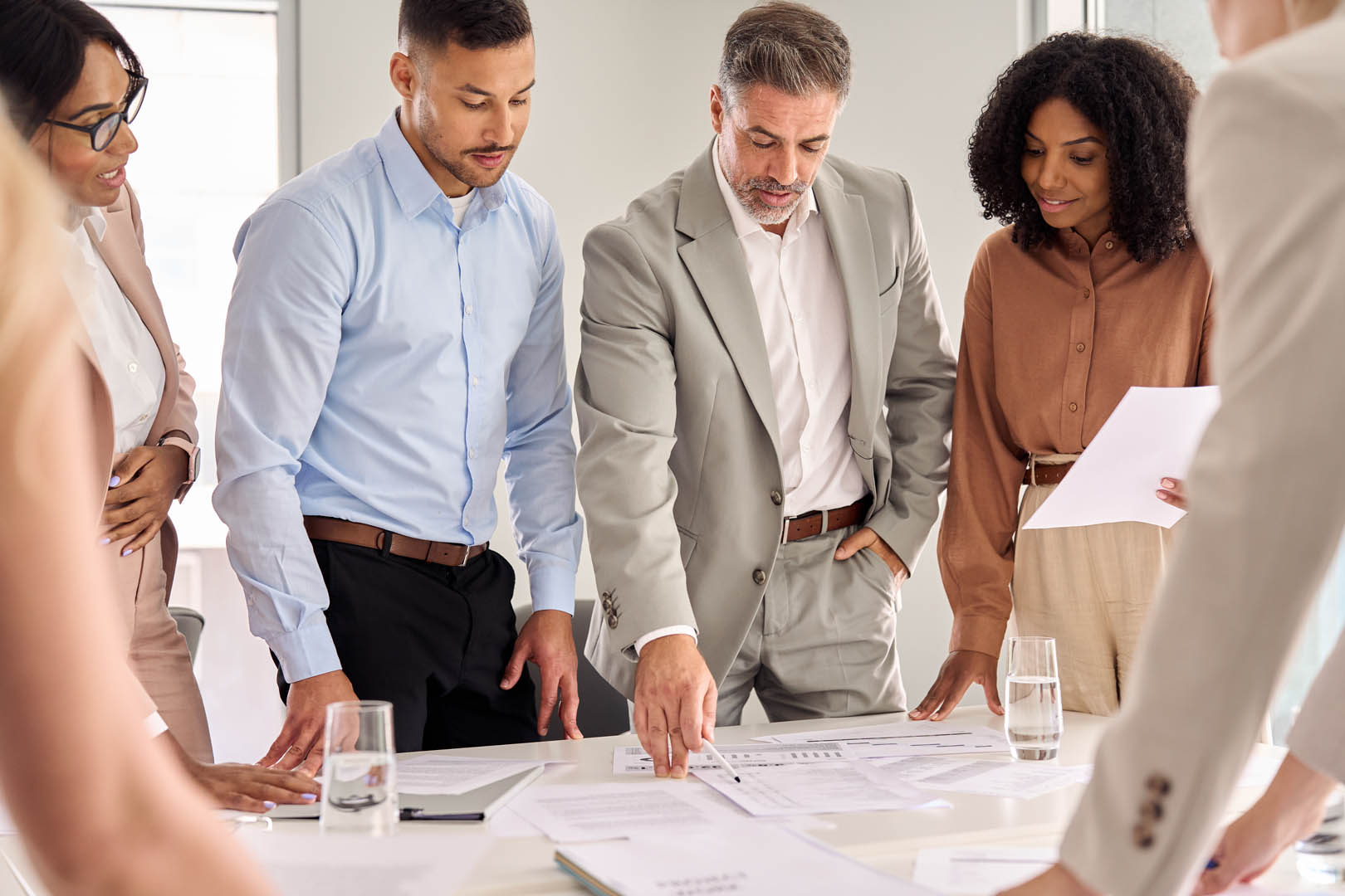 Business team collaborating on strategic property consulting