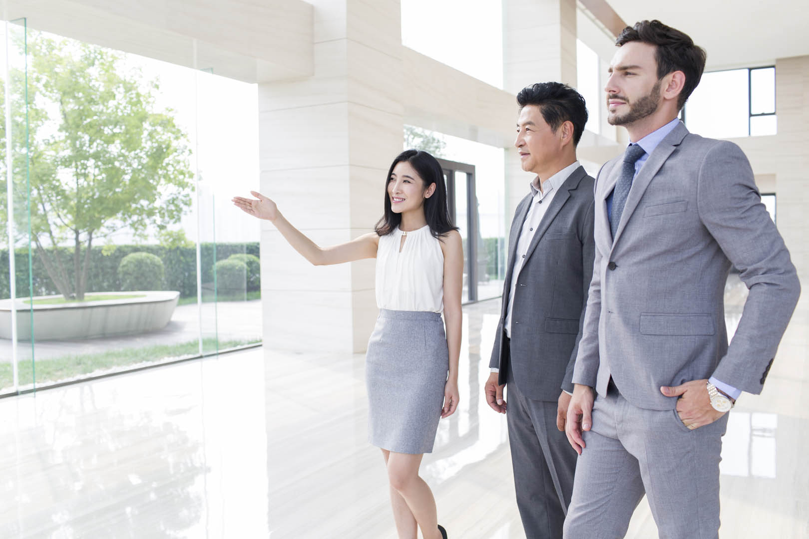 Professional leasing team discussing property solutions