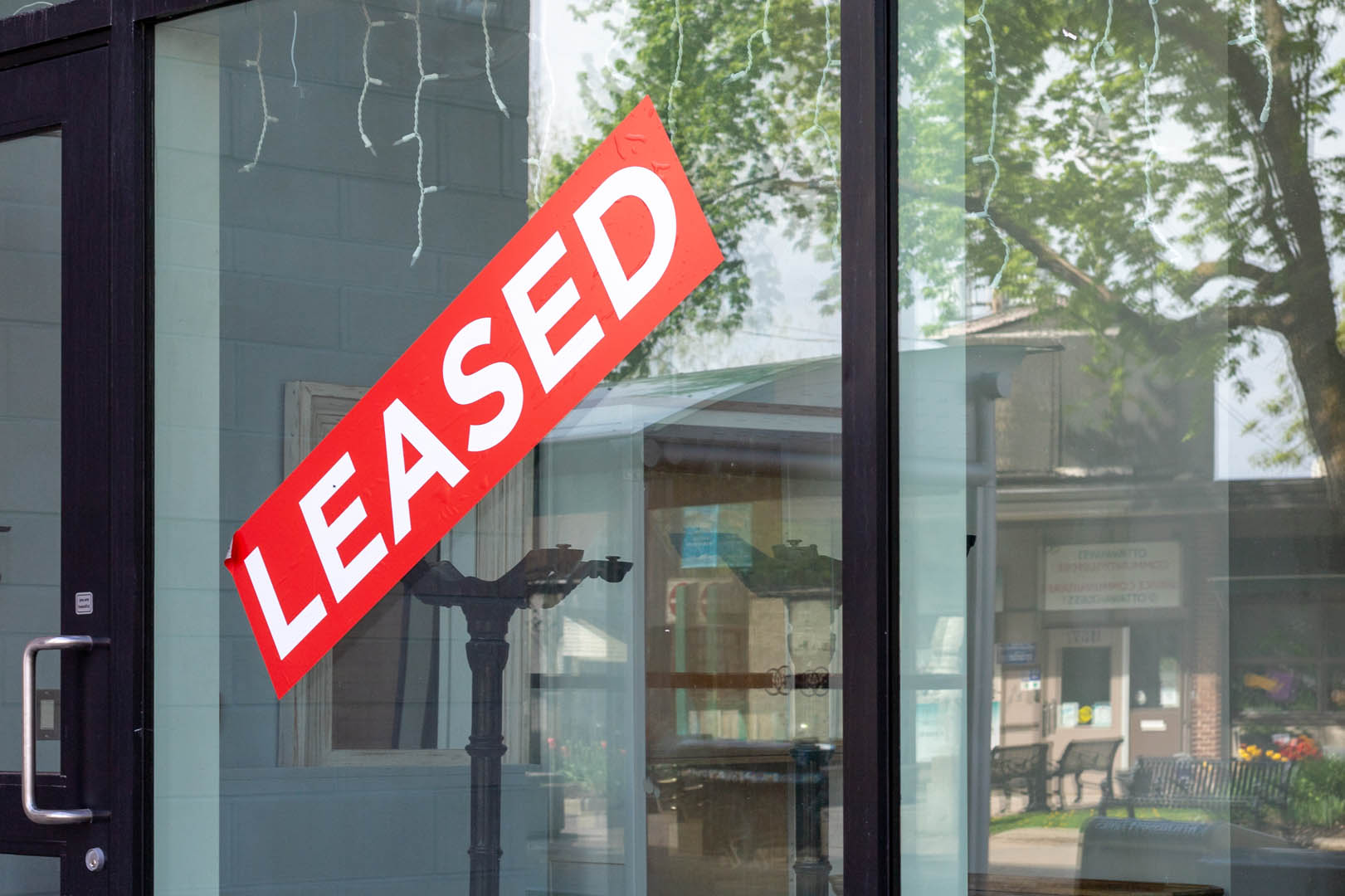 Leased sign on commercial property window