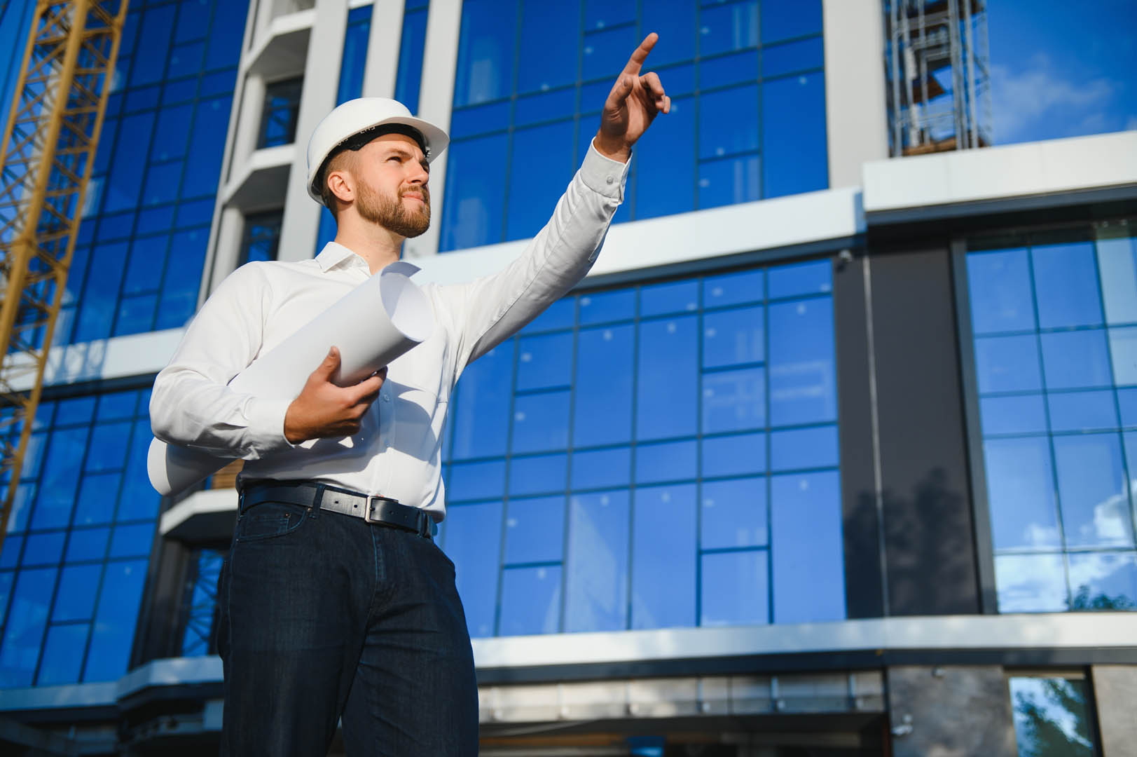 Professional engineer reviewing commercial property plans